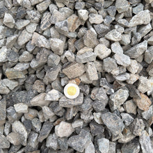 Load image into Gallery viewer, Close-up of small gravel stones with a single white stone standing out.