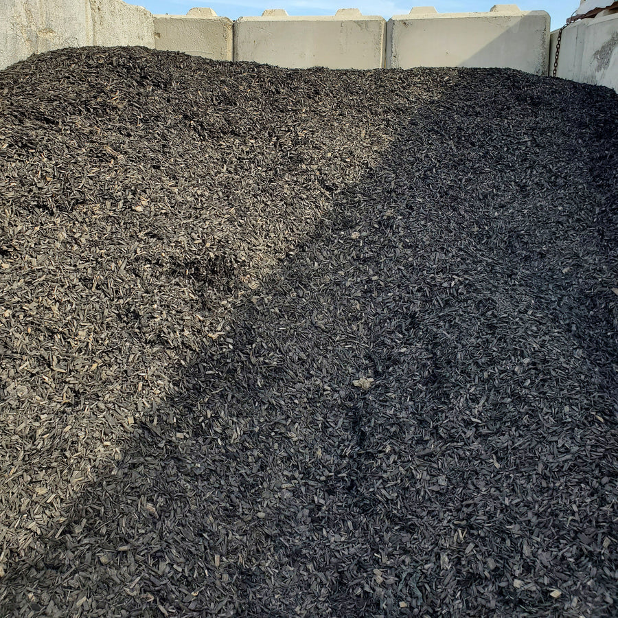 bin of black mulch in Calgary